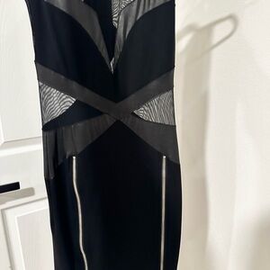 Peekaboo black dress with zipper detail